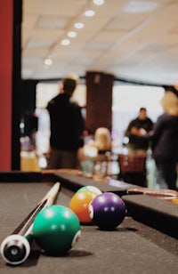 a pool table in a bar