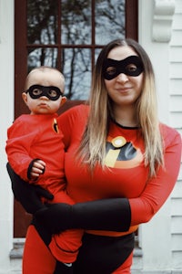 a woman and child dressed up as the incredibles