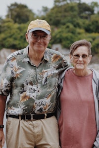 an older couple posing for a photo