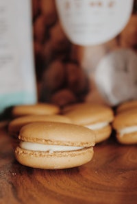 coconut macaroons on a wooden cutting board