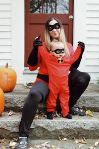 a woman and child dressed up as the incredibles