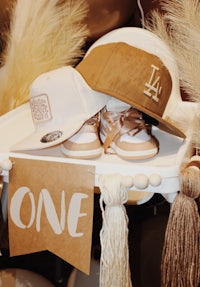 a pair of shoes and a hat on a shelf